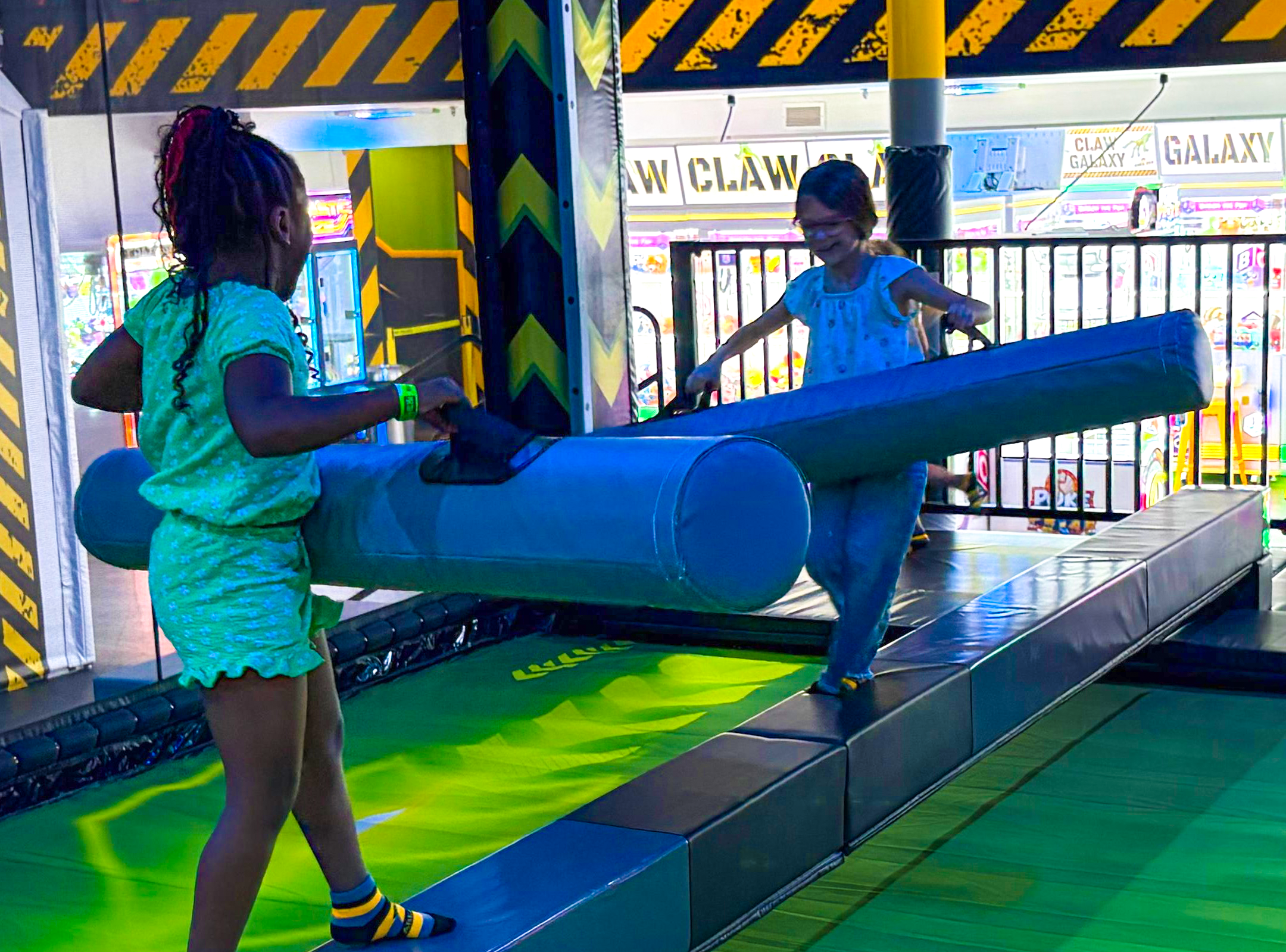 two kids on a ninja course